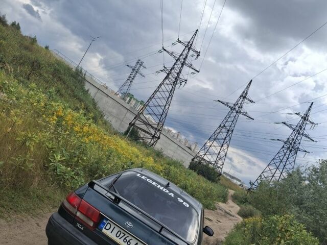 Зеленый Тойота Карина, объемом двигателя 2 л и пробегом 359 тыс. км за 2000 $, фото 1 на Automoto.ua