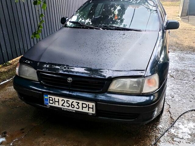 Зеленый Тойота Карина, объемом двигателя 2 л и пробегом 525 тыс. км за 2400 $, фото 1 на Automoto.ua