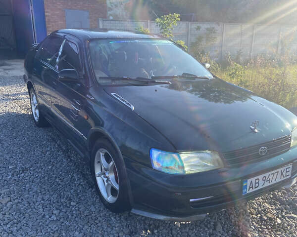 Зелений Тойота Каріна, об'ємом двигуна 1.76 л та пробігом 372 тис. км за 2150 $, фото 1 на Automoto.ua