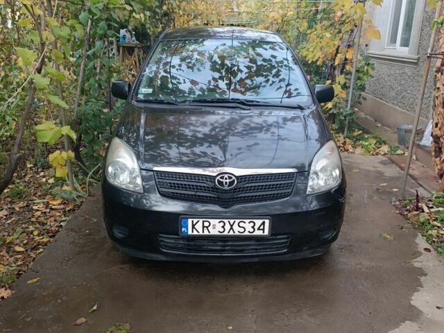 Черный Тойота Королла Версо, объемом двигателя 2 л и пробегом 39 тыс. км за 2450 $, фото 1 на Automoto.ua