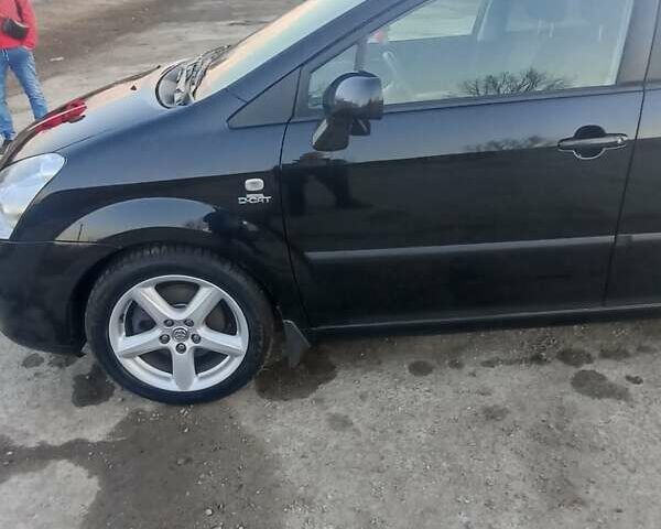 Черный Тойота Королла Версо, объемом двигателя 2.2 л и пробегом 221 тыс. км за 6300 $, фото 1 на Automoto.ua