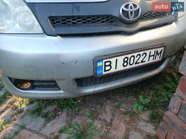 Серый Тойота Королла Версо, объемом двигателя 2 л и пробегом 450 тыс. км за 2350 $, фото 1 на Automoto.ua