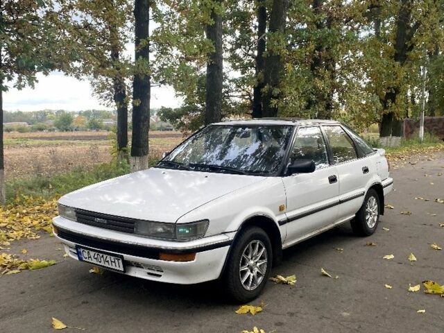 Белый Тойота Королла, объемом двигателя 1.6 л и пробегом 490 тыс. км за 850 $, фото 1 на Automoto.ua