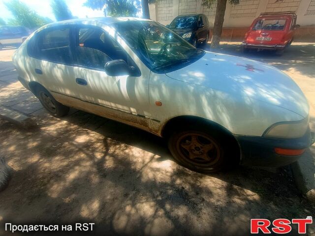 Белый Тойота Королла, объемом двигателя 1.3 л и пробегом 462 тыс. км за 1560 $, фото 1 на Automoto.ua