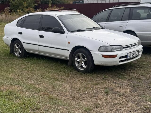 Белый Тойота Королла, объемом двигателя 1.4 л и пробегом 250 тыс. км за 1500 $, фото 1 на Automoto.ua