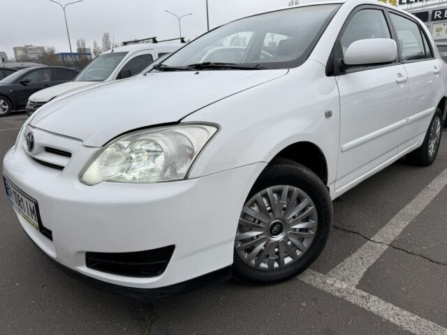 Белый Тойота Королла, объемом двигателя 1.4 л и пробегом 169 тыс. км за 5000 $, фото 1 на Automoto.ua