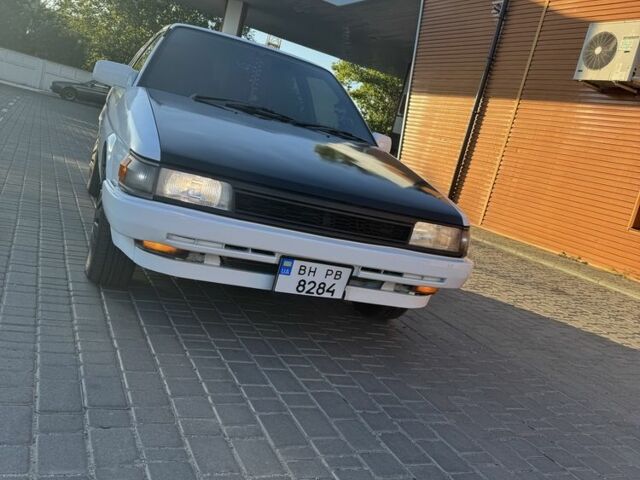 Белый Тойота Королла, объемом двигателя 1.3 л и пробегом 235 тыс. км за 1350 $, фото 1 на Automoto.ua