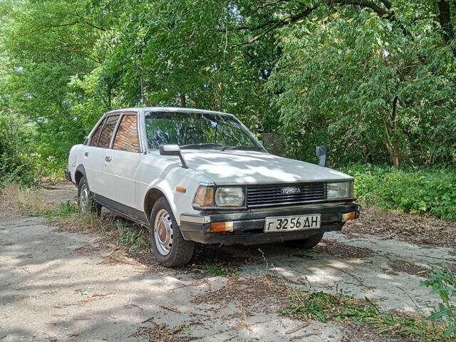 Белый Тойота Королла, объемом двигателя 1.3 л и пробегом 238 тыс. км за 595 $, фото 1 на Automoto.ua