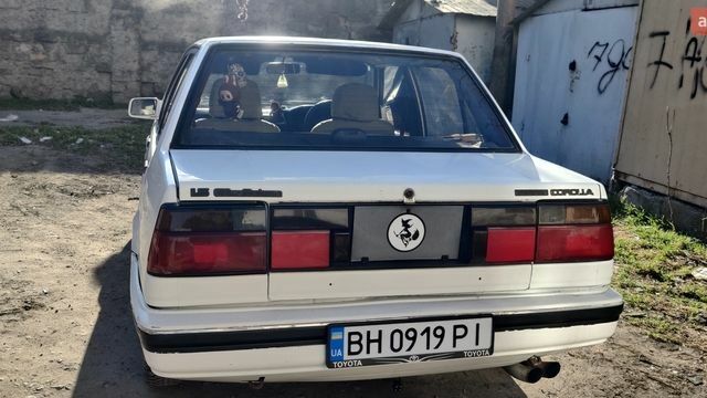 Белый Тойота Королла, объемом двигателя 1.45 л и пробегом 100 тыс. км за 1100 $, фото 1 на Automoto.ua