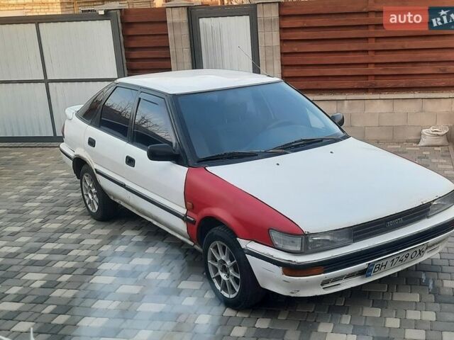 Белый Тойота Королла, объемом двигателя 1.3 л и пробегом 676 тыс. км за 1000 $, фото 1 на Automoto.ua