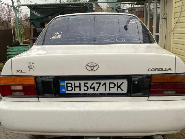 Белый Тойота Королла, объемом двигателя 1.3 л и пробегом 400 тыс. км за 1300 $, фото 1 на Automoto.ua