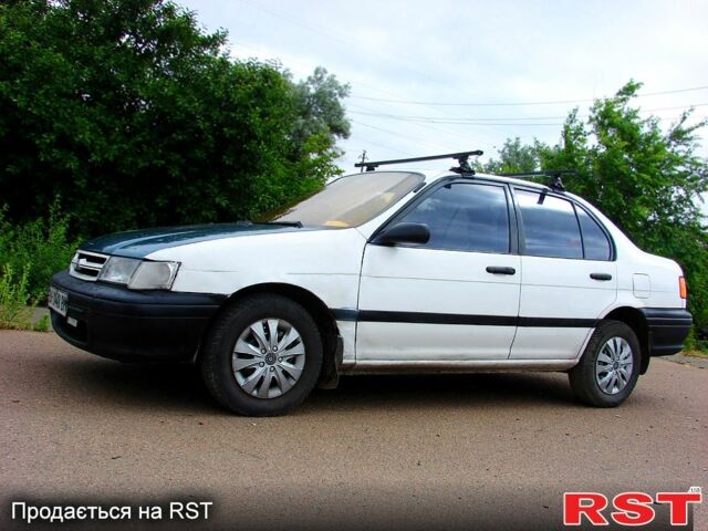 Белый Тойота Королла, объемом двигателя 1.3 л и пробегом 326 тыс. км за 1600 $, фото 1 на Automoto.ua