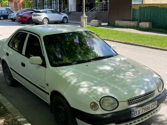 Белый Тойота Королла, объемом двигателя 1.3 л и пробегом 261 тыс. км за 2700 $, фото 1 на Automoto.ua