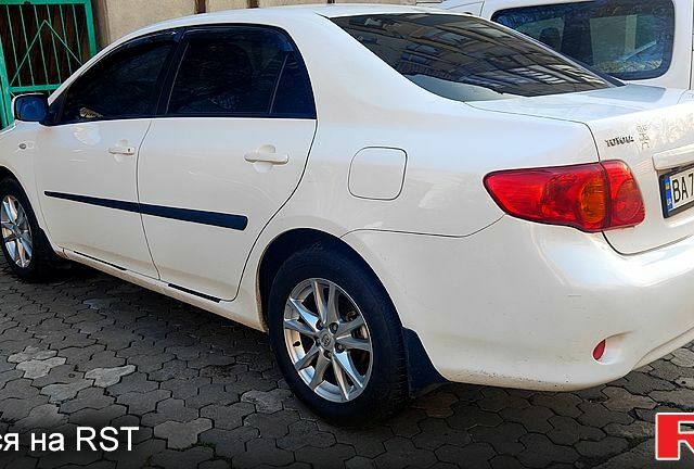 Білий Тойота Королла, об'ємом двигуна 1.6 л та пробігом 23700 тис. км за 6099 $, фото 1 на Automoto.ua