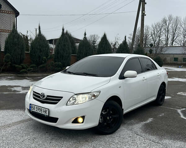 Білий Тойота Королла, об'ємом двигуна 1.6 л та пробігом 194 тис. км за 6900 $, фото 1 на Automoto.ua