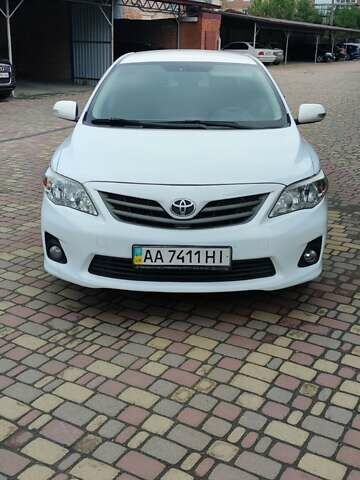 Белый Тойота Королла, объемом двигателя 1.33 л и пробегом 223 тыс. км за 6900 $, фото 1 на Automoto.ua