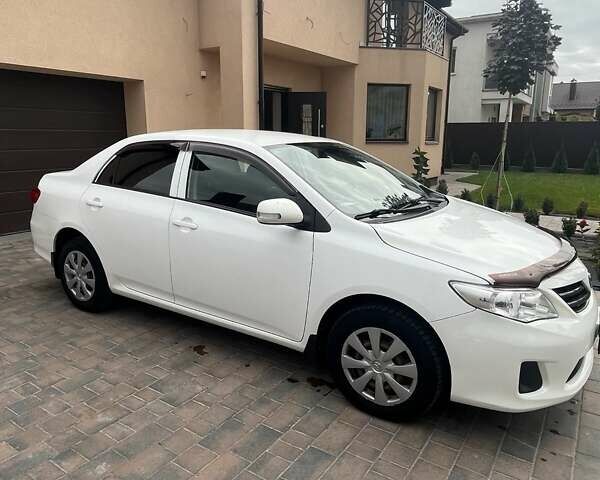 Белый Тойота Королла, объемом двигателя 1.33 л и пробегом 164 тыс. км за 7000 $, фото 1 на Automoto.ua