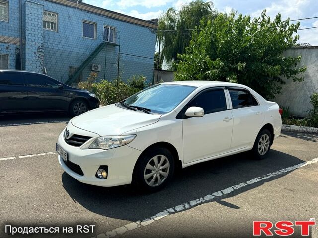 Белый Тойота Королла, объемом двигателя 1.3 л и пробегом 118 тыс. км за 7400 $, фото 1 на Automoto.ua