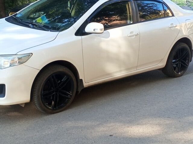 Белый Тойота Королла, объемом двигателя 1.3 л и пробегом 213 тыс. км за 7350 $, фото 1 на Automoto.ua
