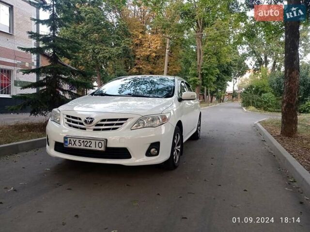 Белый Тойота Королла, объемом двигателя 1.33 л и пробегом 173 тыс. км за 7400 $, фото 1 на Automoto.ua