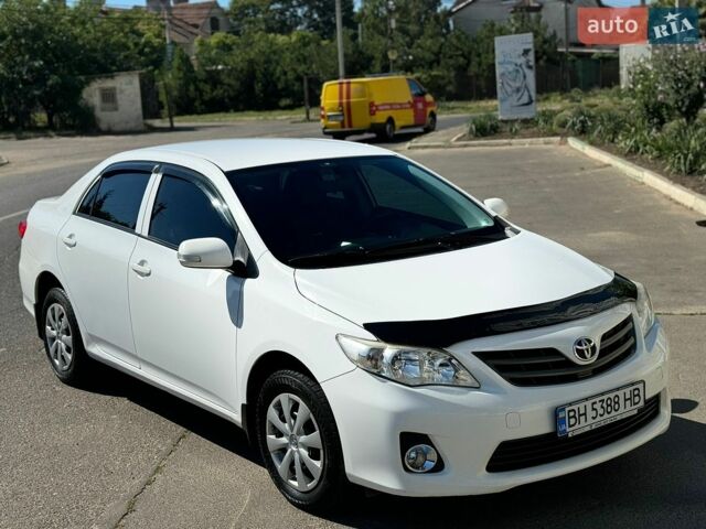 Белый Тойота Королла, объемом двигателя 1.3 л и пробегом 178 тыс. км за 6800 $, фото 1 на Automoto.ua