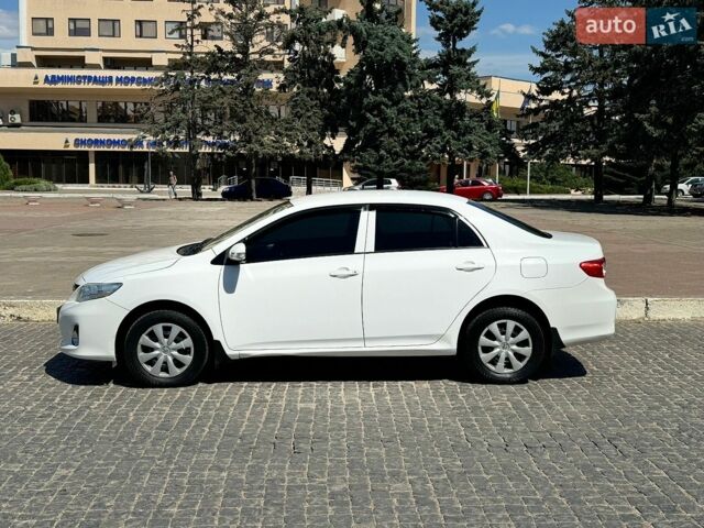 Білий Тойота Королла, об'ємом двигуна 1.33 л та пробігом 148 тис. км за 7000 $, фото 1 на Automoto.ua