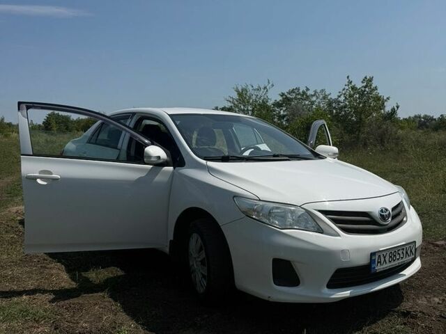 Білий Тойота Королла, об'ємом двигуна 1.33 л та пробігом 275 тис. км за 6100 $, фото 1 на Automoto.ua