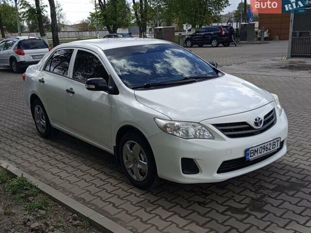 Белый Тойота Королла, объемом двигателя 1.33 л и пробегом 115 тыс. км за 7250 $, фото 1 на Automoto.ua