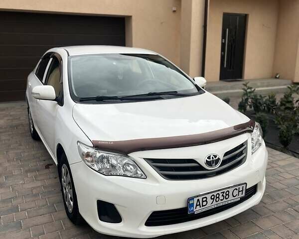 Белый Тойота Королла, объемом двигателя 1.33 л и пробегом 164 тыс. км за 7000 $, фото 1 на Automoto.ua