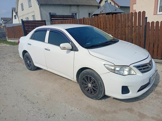 Белый Тойота Королла, объемом двигателя 1.33 л и пробегом 217 тыс. км за 5600 $, фото 1 на Automoto.ua