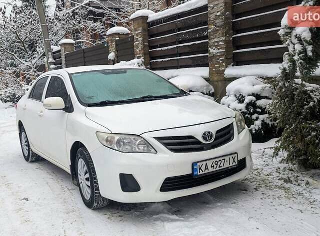 Белый Тойота Королла, объемом двигателя 1.33 л и пробегом 264 тыс. км за 6500 $, фото 1 на Automoto.ua