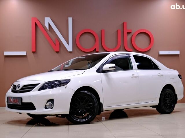 Белый Тойота Королла, объемом двигателя 1.6 л и пробегом 119 тыс. км за 7900 $, фото 1 на Automoto.ua