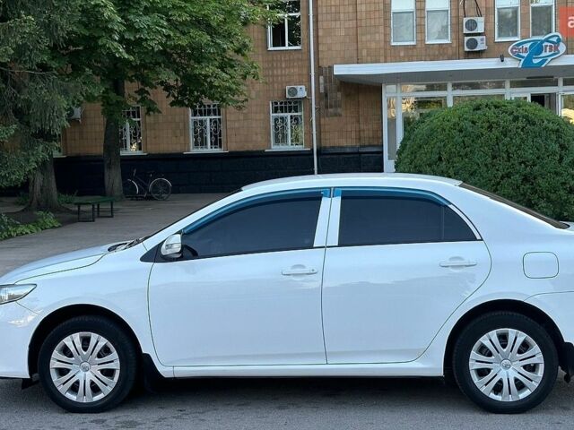 Белый Тойота Королла, объемом двигателя 1.6 л и пробегом 115 тыс. км за 8800 $, фото 1 на Automoto.ua