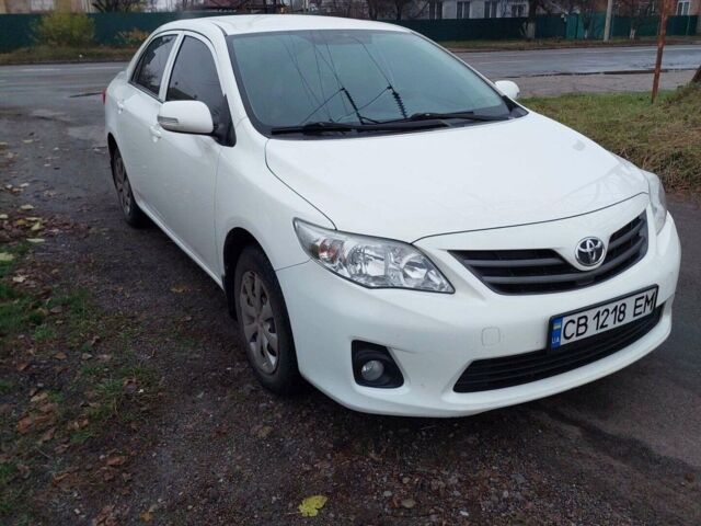 Білий Тойота Королла, об'ємом двигуна 1.33 л та пробігом 102 тис. км за 8200 $, фото 1 на Automoto.ua