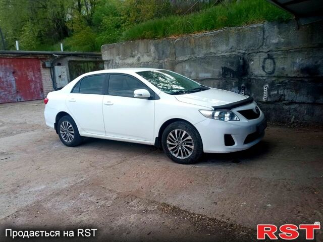 Білий Тойота Королла, об'ємом двигуна 1.6 л та пробігом 165 тис. км за 9500 $, фото 1 на Automoto.ua