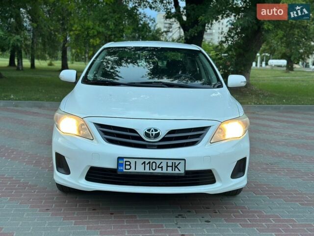Білий Тойота Королла, об'ємом двигуна 1.33 л та пробігом 203 тис. км за 7200 $, фото 1 на Automoto.ua