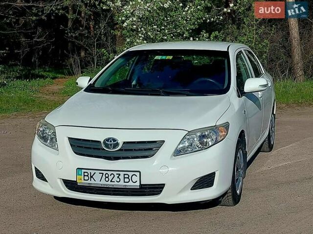 Белый Тойота Королла, объемом двигателя 1.33 л и пробегом 128 тыс. км за 6900 $, фото 1 на Automoto.ua