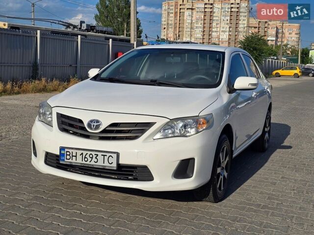 Белый Тойота Королла, объемом двигателя 1.33 л и пробегом 215 тыс. км за 5999 $, фото 1 на Automoto.ua