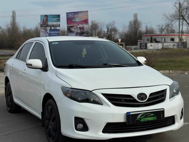 Білий Тойота Королла, об'ємом двигуна 1.6 л та пробігом 209 тис. км за 7750 $, фото 1 на Automoto.ua