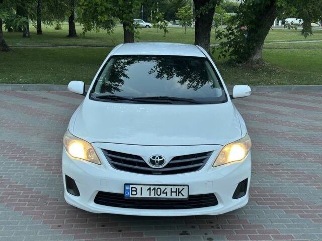 Білий Тойота Королла, об'ємом двигуна 1.3 л та пробігом 202 тис. км за 7400 $, фото 1 на Automoto.ua
