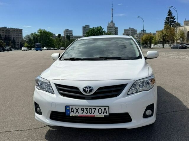 Білий Тойота Королла, об'ємом двигуна 1.33 л та пробігом 154 тис. км за 9800 $, фото 1 на Automoto.ua