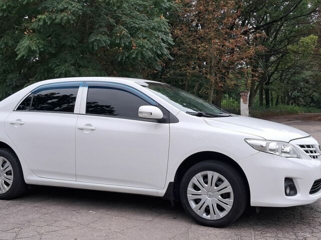 Белый Тойота Королла, объемом двигателя 1.6 л и пробегом 108 тыс. км за 8900 $, фото 1 на Automoto.ua