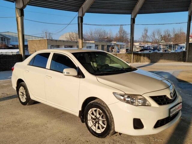 Белый Тойота Королла, объемом двигателя 0 л и пробегом 128 тыс. км за 7999 $, фото 1 на Automoto.ua