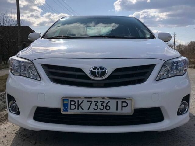 Білий Тойота Королла, об'ємом двигуна 1.33 л та пробігом 216 тис. км за 6899 $, фото 1 на Automoto.ua