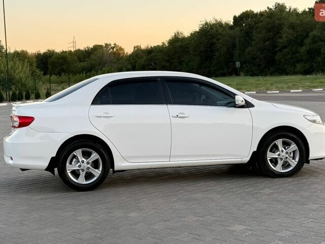 Белый Тойота Королла, объемом двигателя 1.6 л и пробегом 108 тыс. км за 9700 $, фото 1 на Automoto.ua