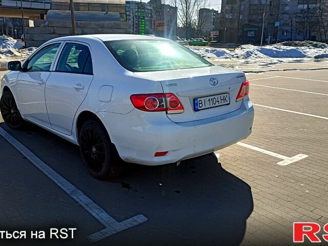 Белый Тойота Королла, объемом двигателя 1.3 л и пробегом 198 тыс. км за 6950 $, фото 1 на Automoto.ua