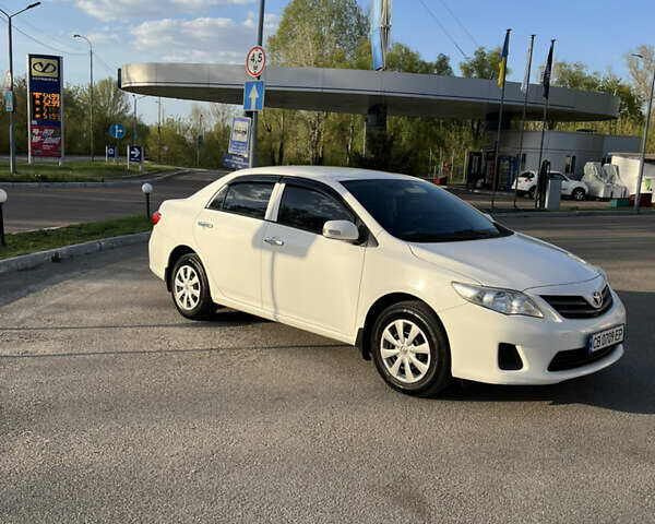 Белый Тойота Королла, объемом двигателя 1.3 л и пробегом 184 тыс. км за 7650 $, фото 1 на Automoto.ua