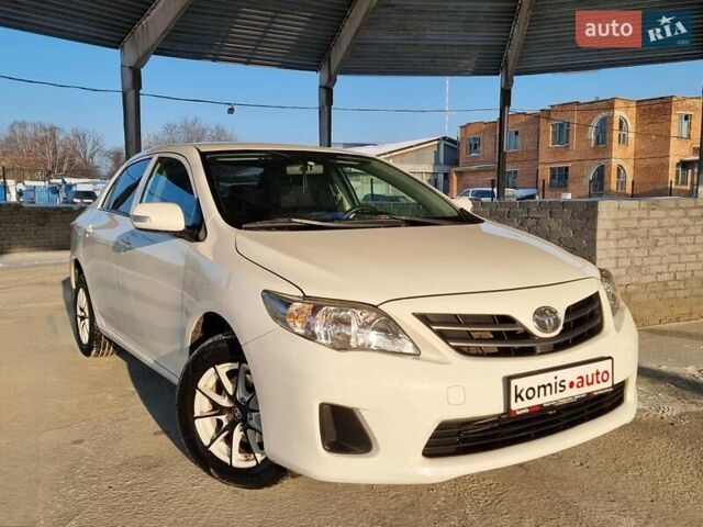 Белый Тойота Королла, объемом двигателя 1.3 л и пробегом 128 тыс. км за 7999 $, фото 1 на Automoto.ua
