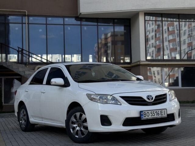 Белый Тойота Королла, объемом двигателя 1.3 л и пробегом 246 тыс. км за 6400 $, фото 1 на Automoto.ua