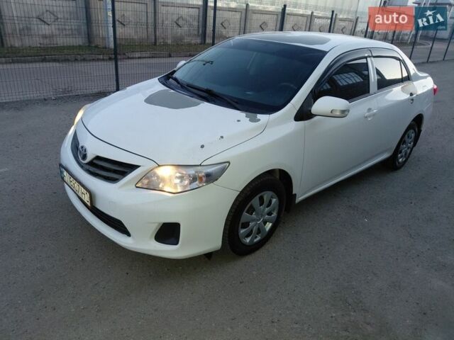 Білий Тойота Королла, об'ємом двигуна 1.33 л та пробігом 189 тис. км за 4950 $, фото 1 на Automoto.ua